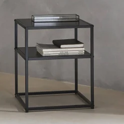 Black metal bedside table with shelf