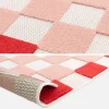 Checkered indoor/outdoor rug pink and red