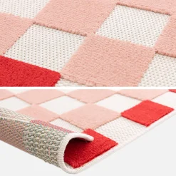 Checkered indoor/outdoor rug pink and red