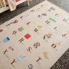 Children's indoor rug beige with French alphabet print
