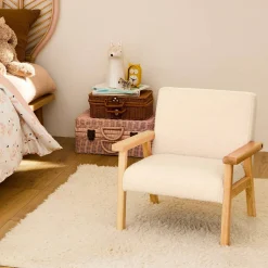 Children's scandi-style armchair in boucle fabric, rubberwood