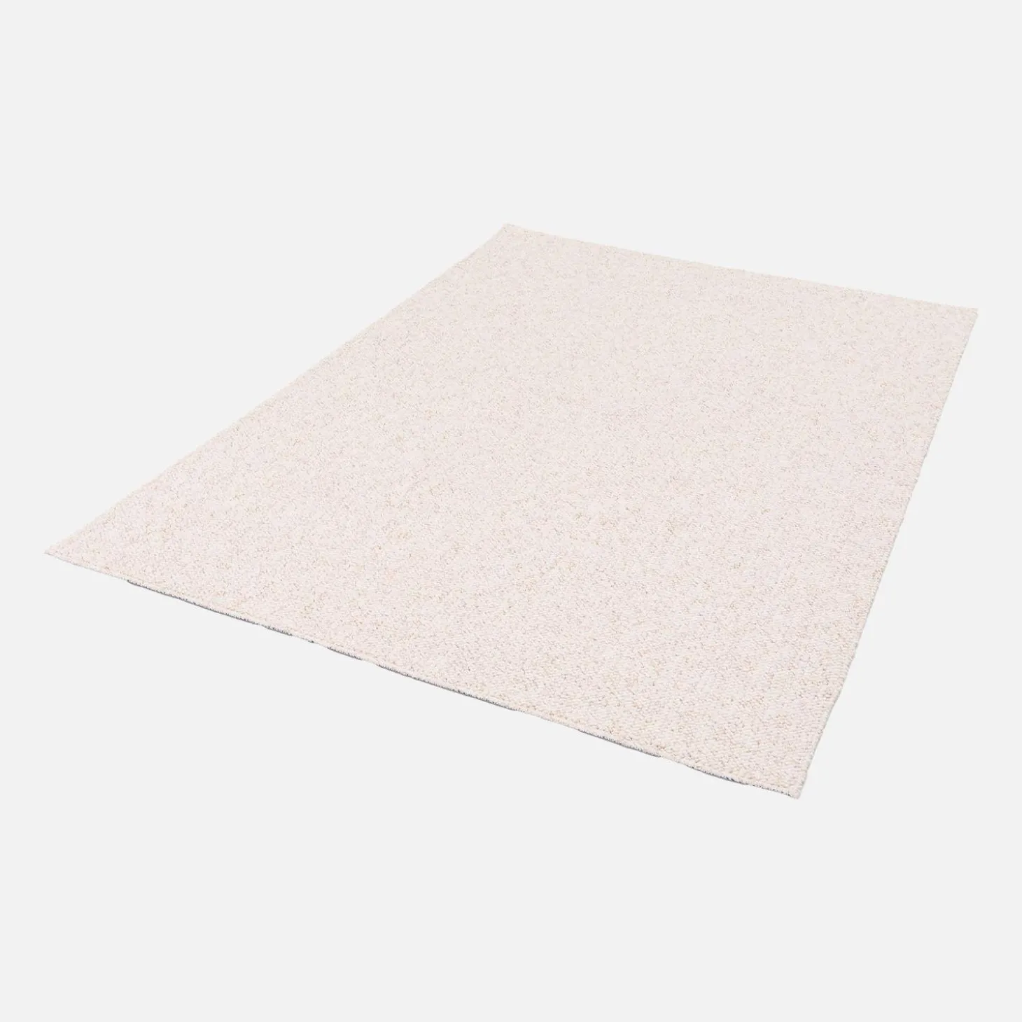 Cream mottled effect loop pile interior rug