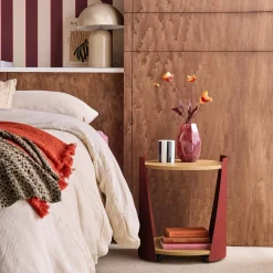Curved metal side table or bedside table with wood decor and casters