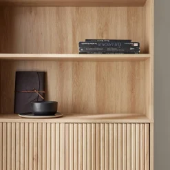2-door bookcase with wooden decor and metal