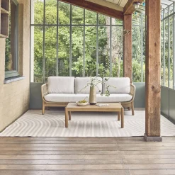 Indoor/outdoor rug with beige arch pattern, recycled polyester