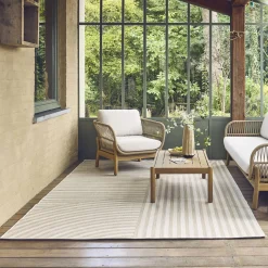 Indoor/outdoor rug with beige arch pattern, recycled polyester