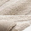 Indoor rug with beige striped pattern