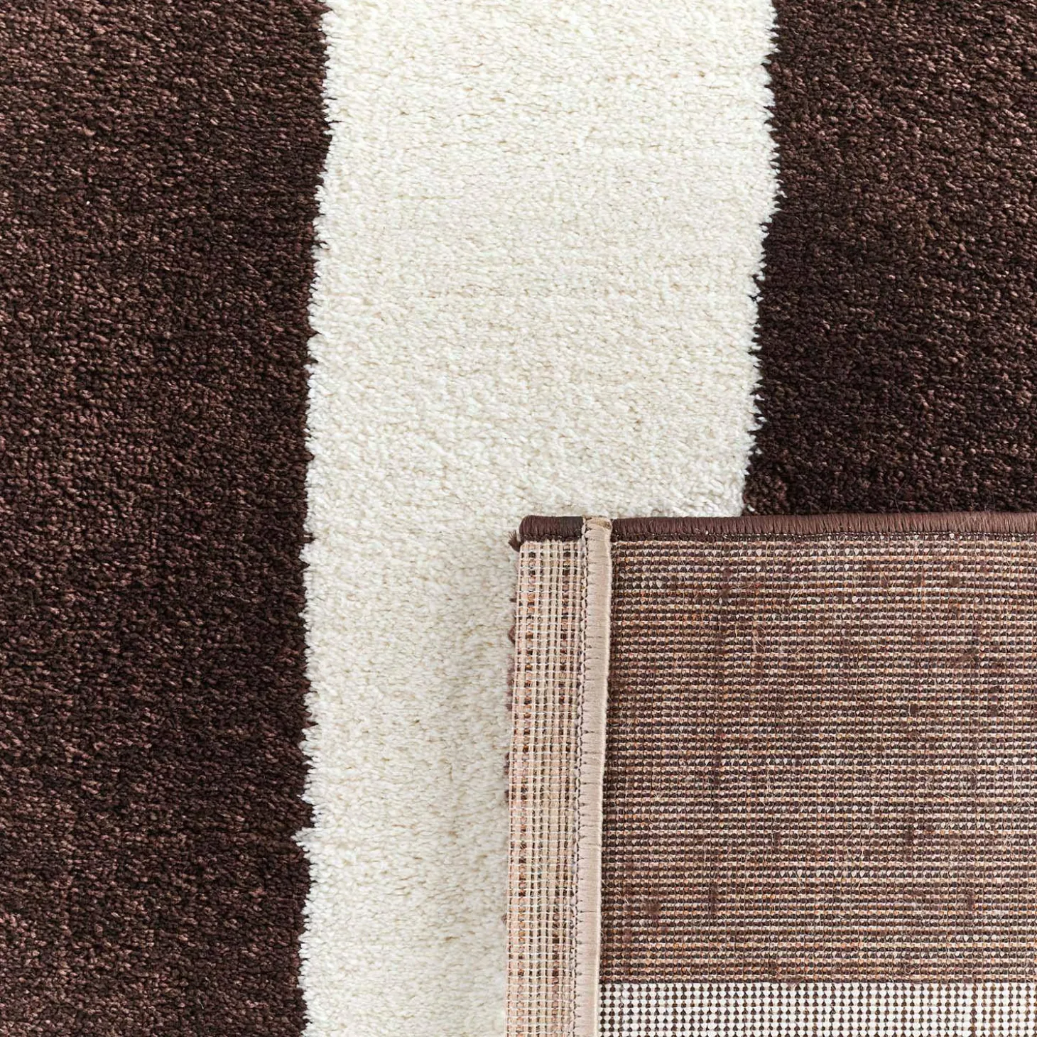 Indoor rug with brown and white stripes