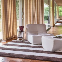 Indoor rug with brown and white stripes
