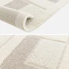 Indoor rug with geometric patterns in cream
