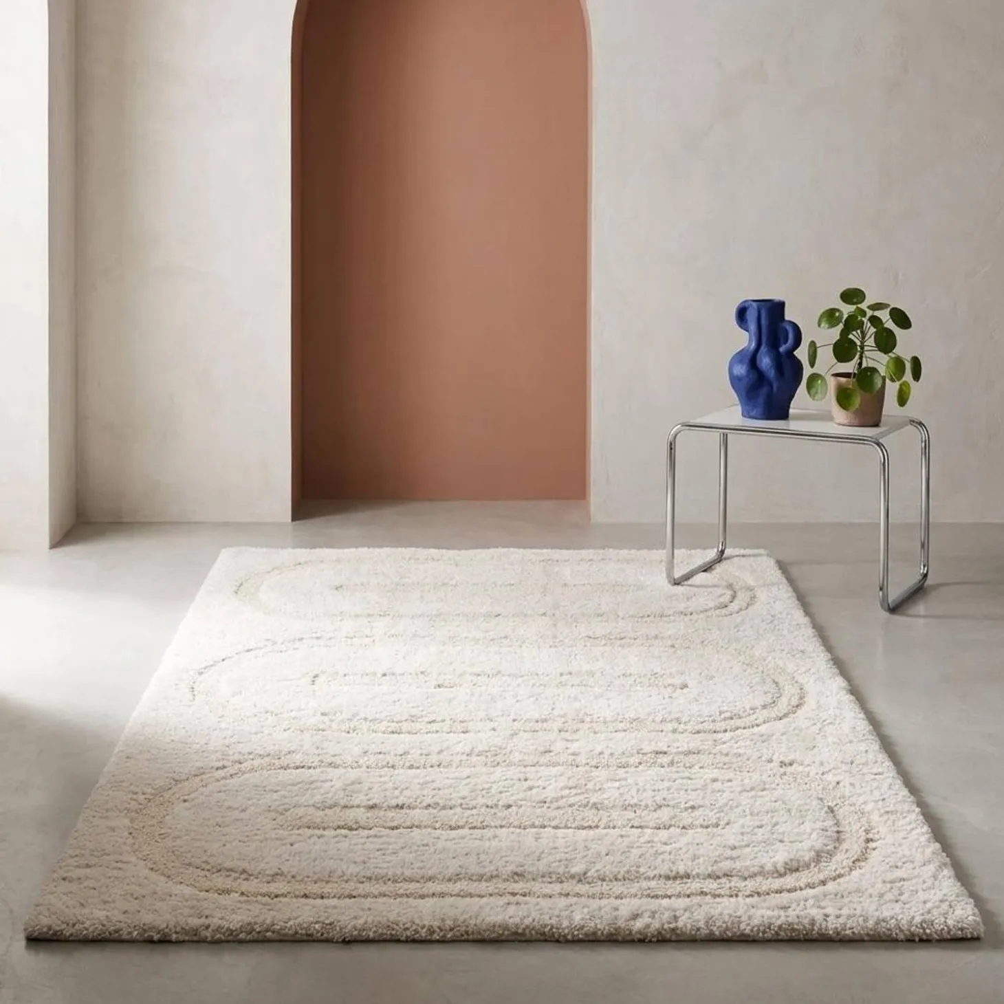 Indoor rug with geometric patterns cream