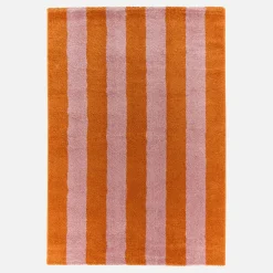 Indoor rug with orange and pink stripes