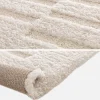 Indoor rug with raised pattern cream
