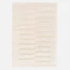 Indoor rug with raised pattern cream