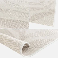 Interior/exterior rug with cream, beige floral pattern
