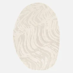 Interior pebble-shaped rug in relief cream