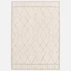 Interior rug with berber pattern, beige and cream