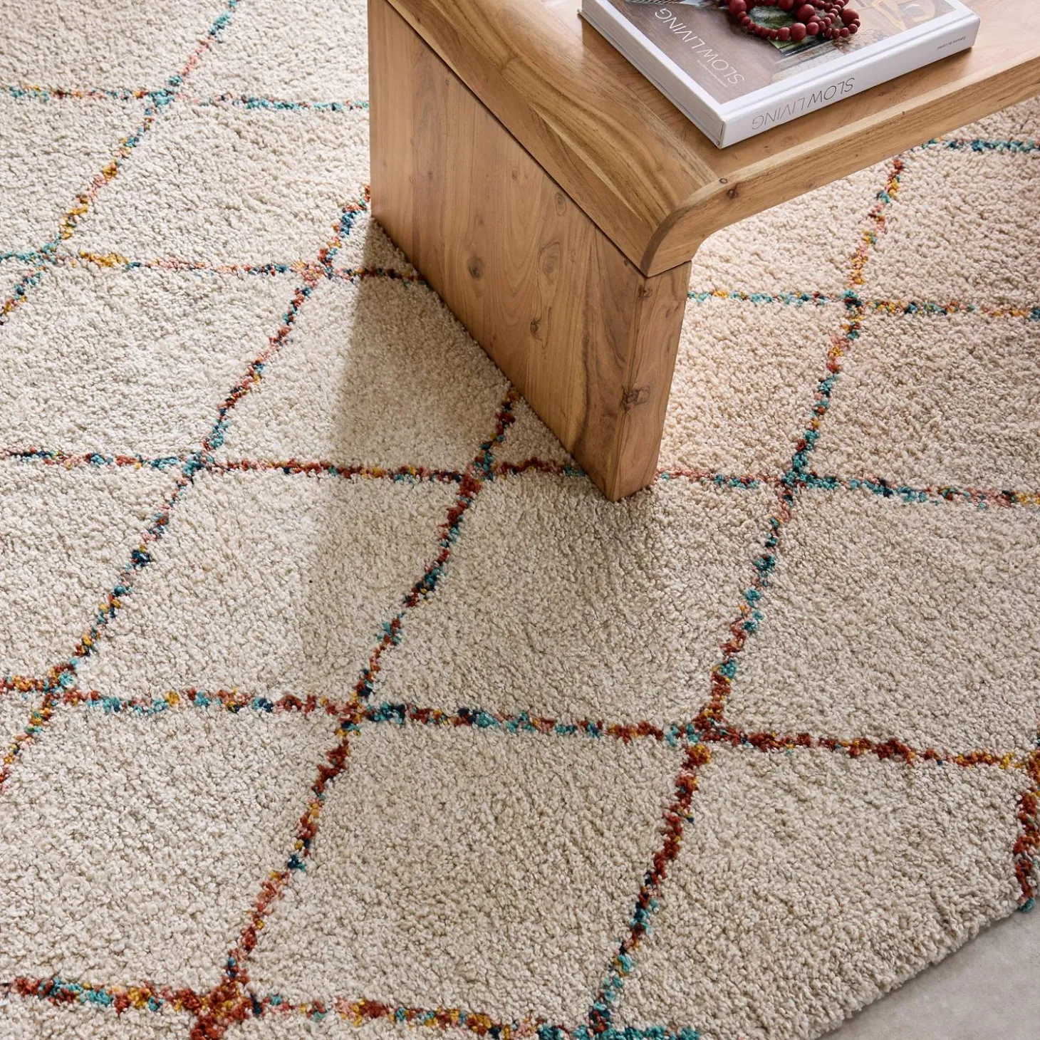 Interior shaggy rug, cream and multicoloured