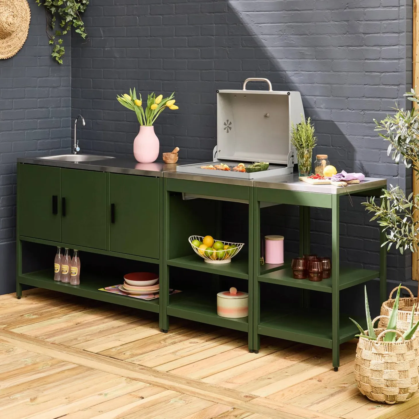 Outdoor kitchen with charcoal barbecue and 3 modules with sink