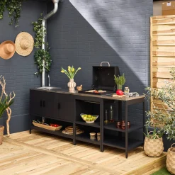 Outdoor kitchen with charcoal barbecue and 3 modules with sink