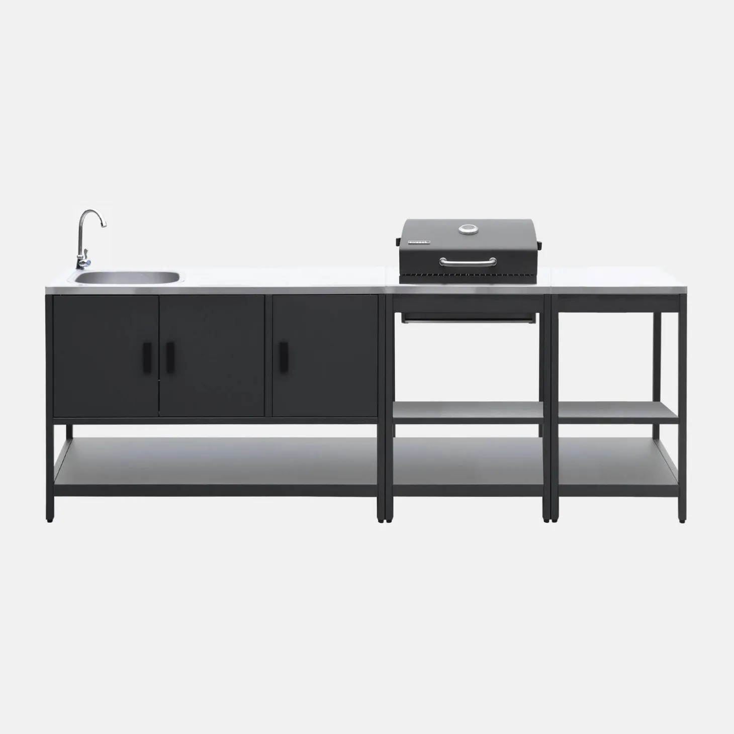 Outdoor kitchen with charcoal barbecue and 3 modules with sink