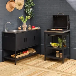 Outdoor kitchen with charcoal barbecue and 2 modules with sink