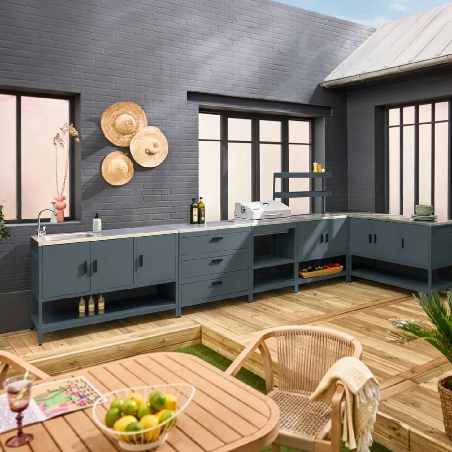 Outdoor kitchen with charcoal barbecue and 5 modules with sink