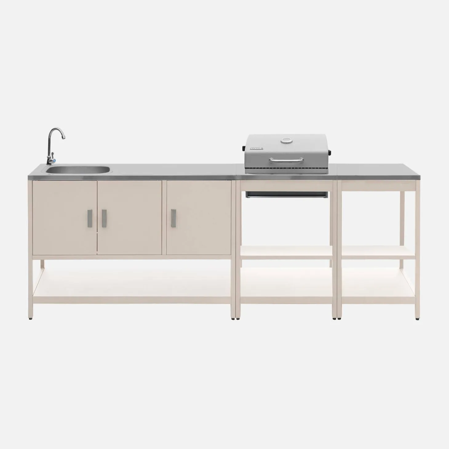 Outdoor kitchen with charcoal barbecue and 3 modules with sink