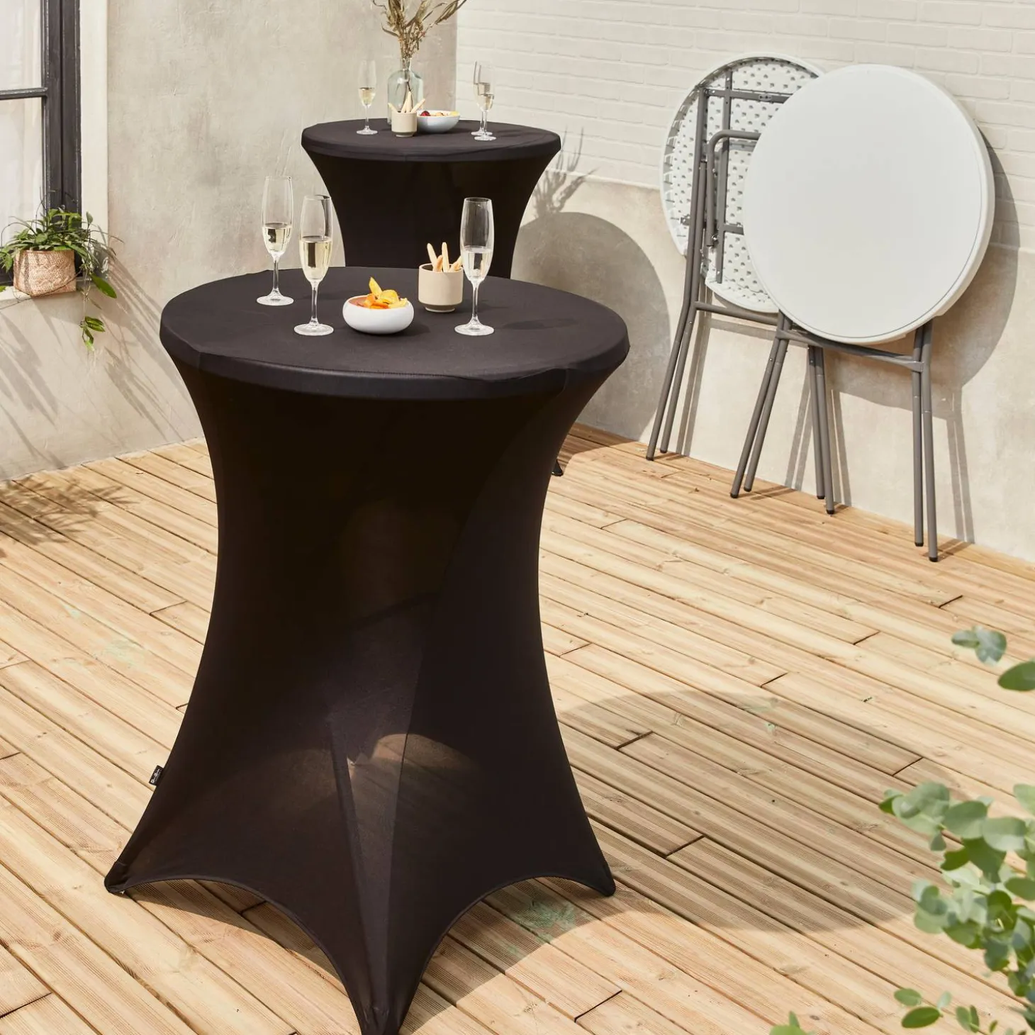 Pair of foldable high tables with protective covers