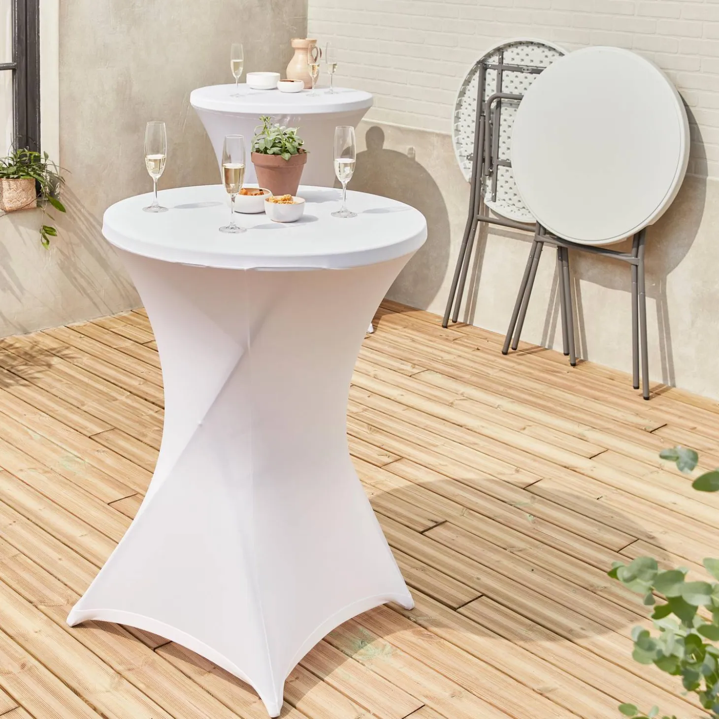 Pair of foldable high tables with protective covers