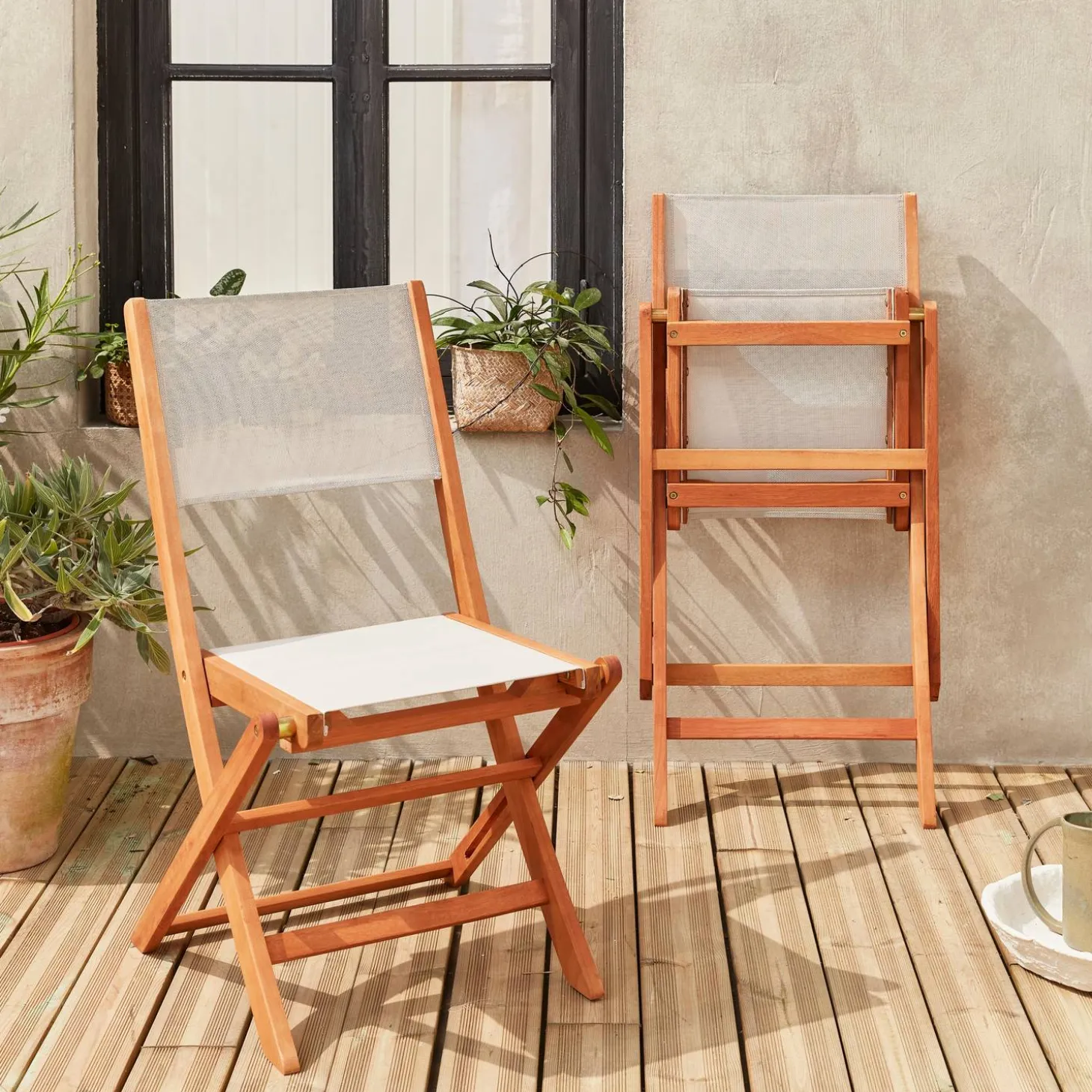 Pair of foldable wooden garden chairs