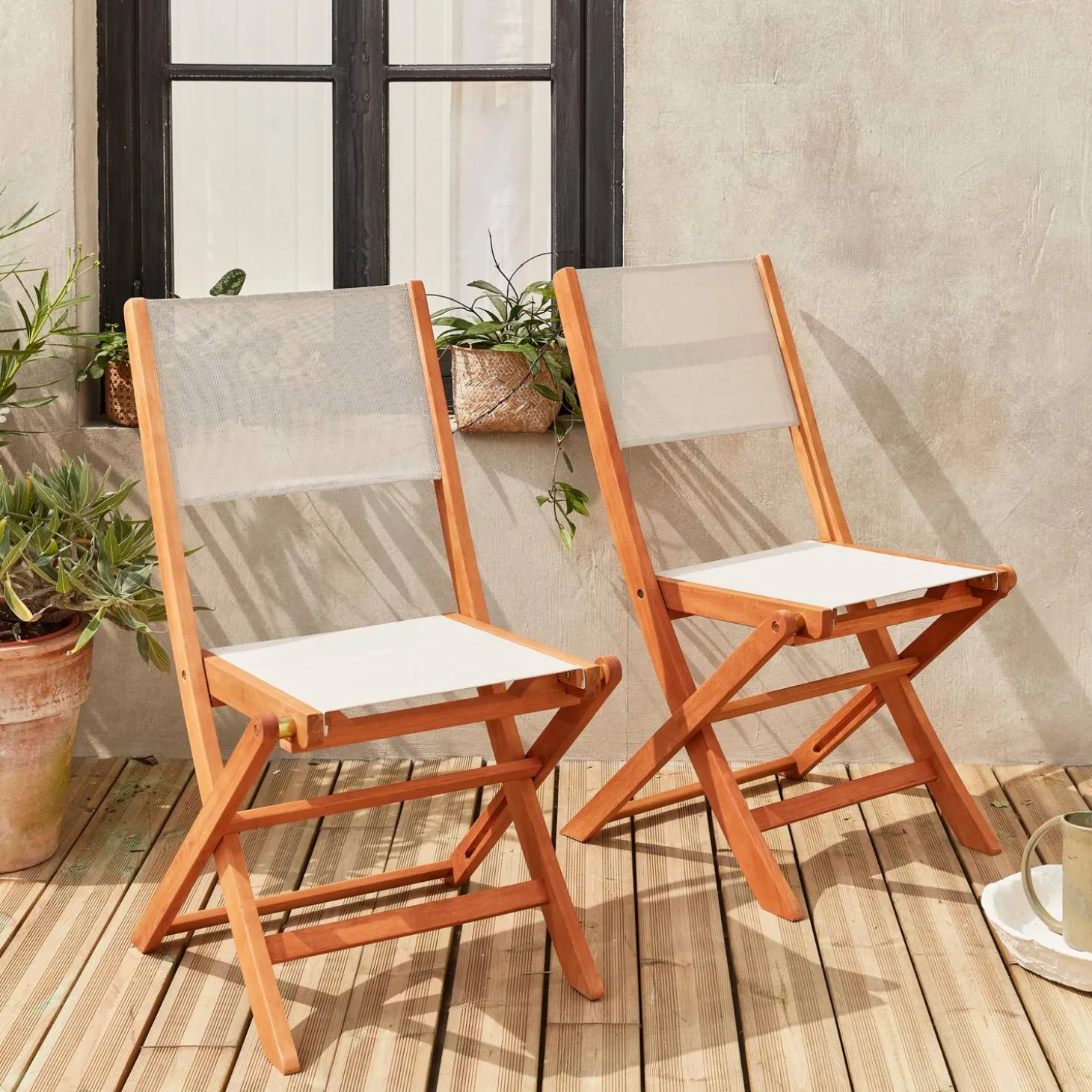 Pair of foldable wooden garden chairs
