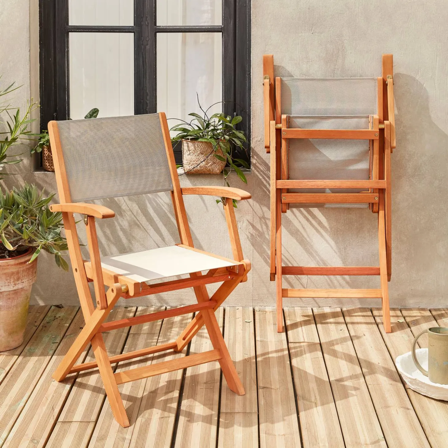 Pair of foldable wooden garden chairs