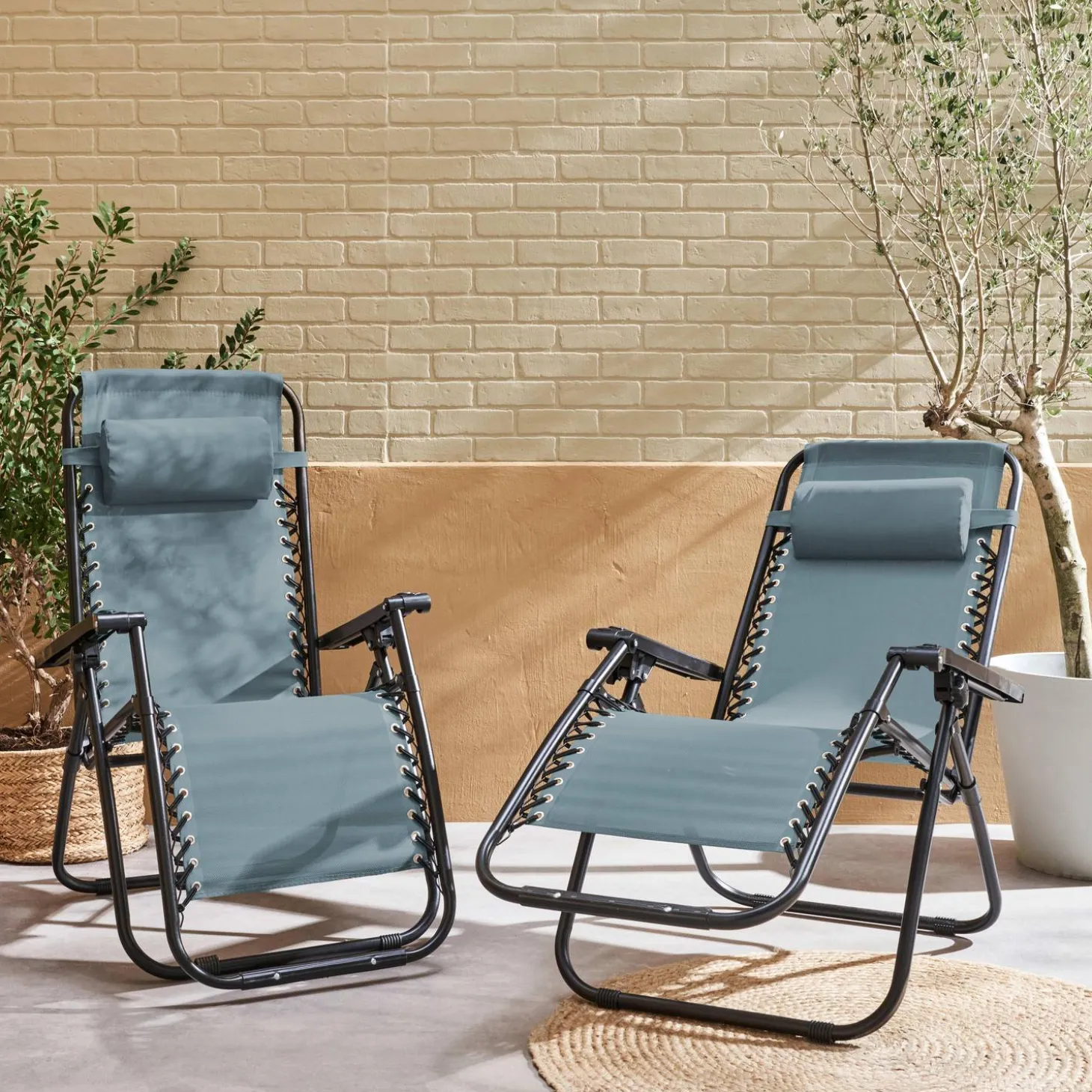 Pair of foldable zero gravity reclining chairs