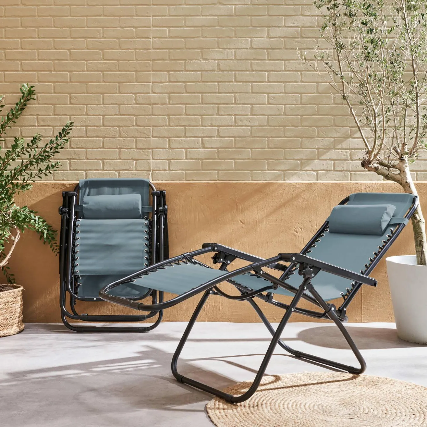 Pair of foldable zero gravity reclining chairs