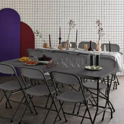 Pair of folding plastic reception tables with 12 chairs