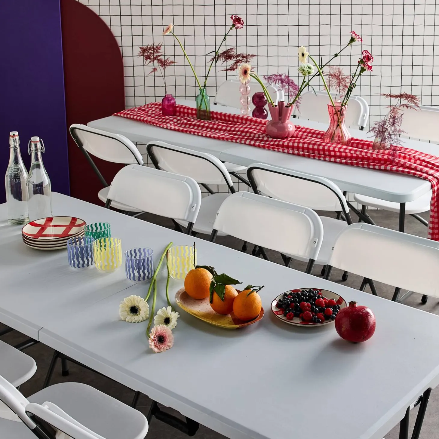 Pair of folding plastic reception tables with 12 chairs