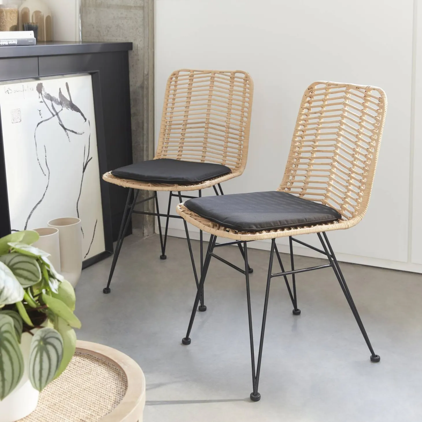 Pair of high-backed rattan dining chairs
