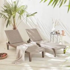Pair of plastic sun loungers with textured wood effect