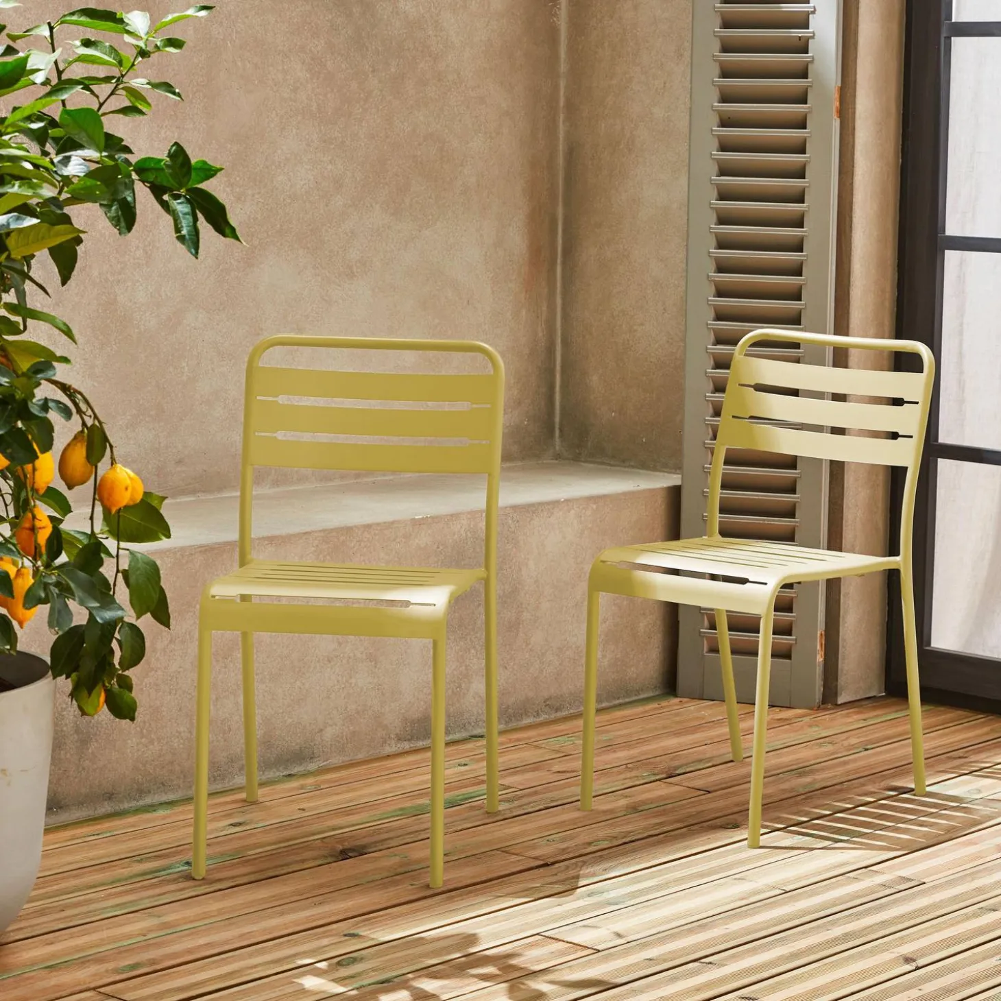 Pair of steel and stackable garden chairs