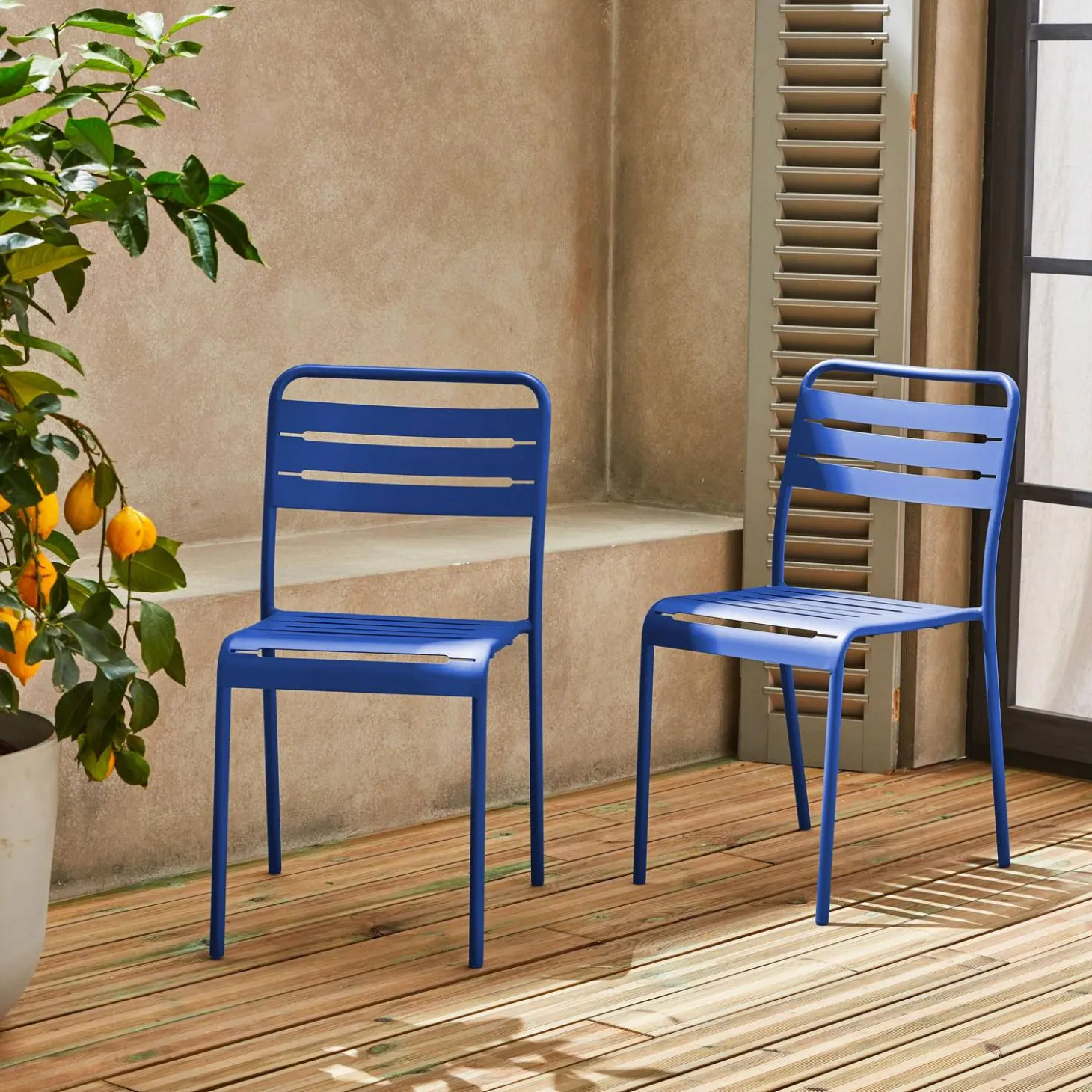 Pair of steel and stackable garden chairs