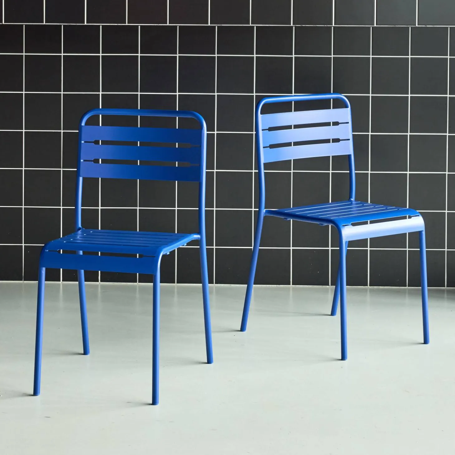 Pair of steel and stackable garden chairs
