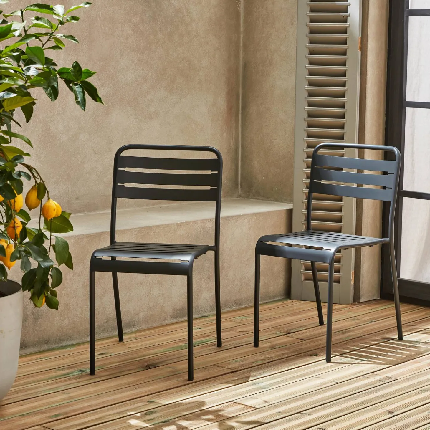Pair of steel and stackable garden chairs