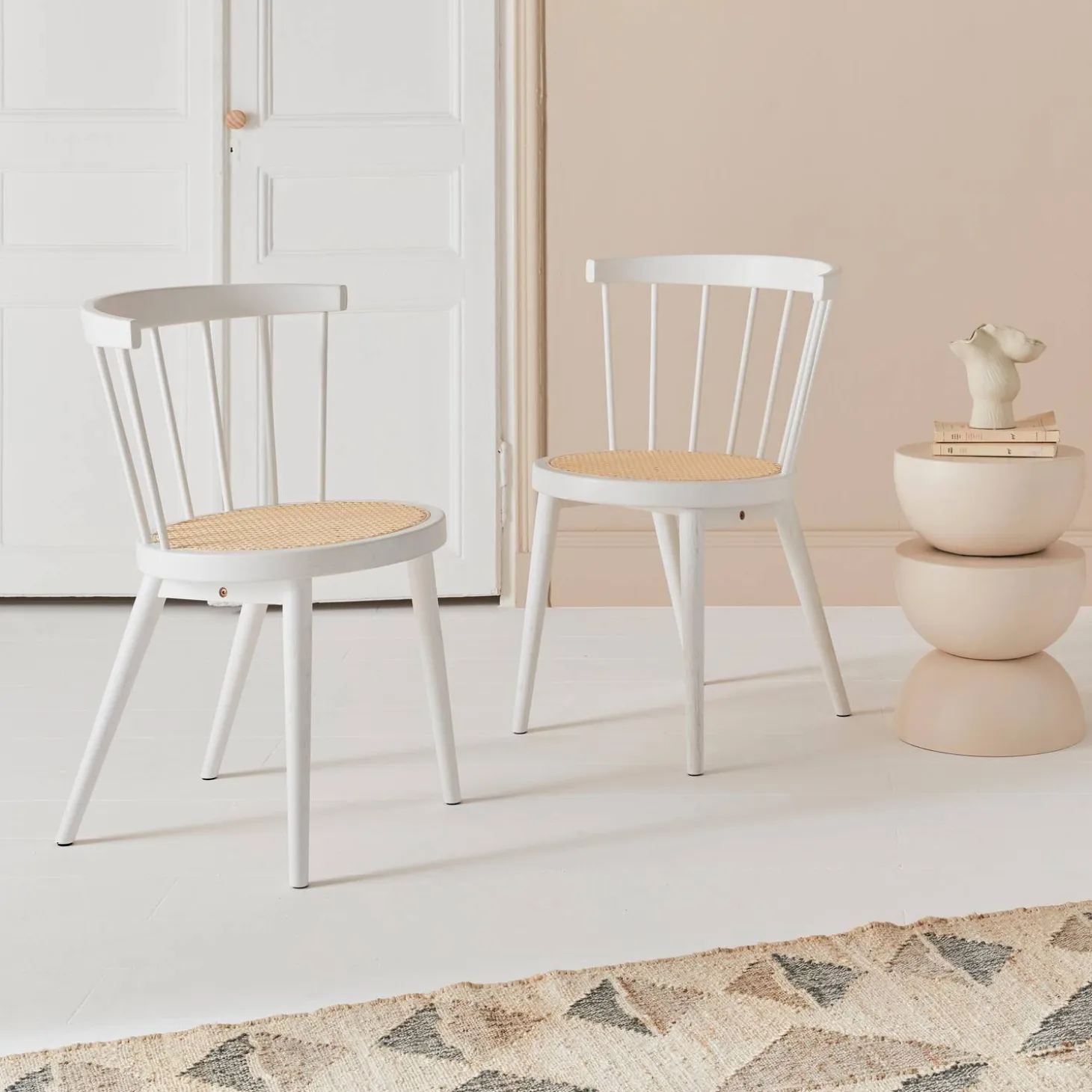 Pair of wood and cane dining chairs
