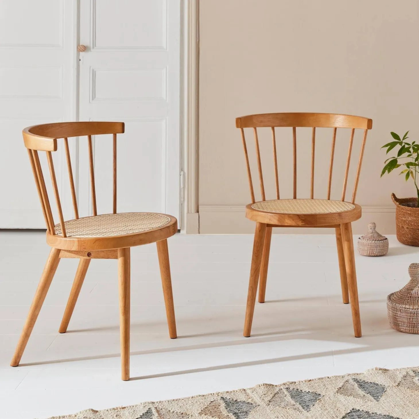 Pair of wood and cane dining chairs