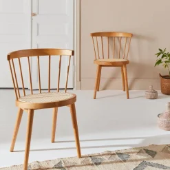 Pair of wood and cane dining chairs
