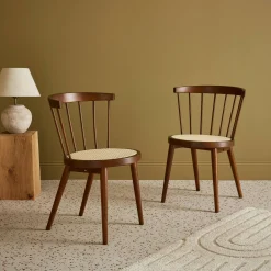 Pair of wood and cane dining chairs