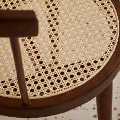 Pair of wood and cane dining chairs