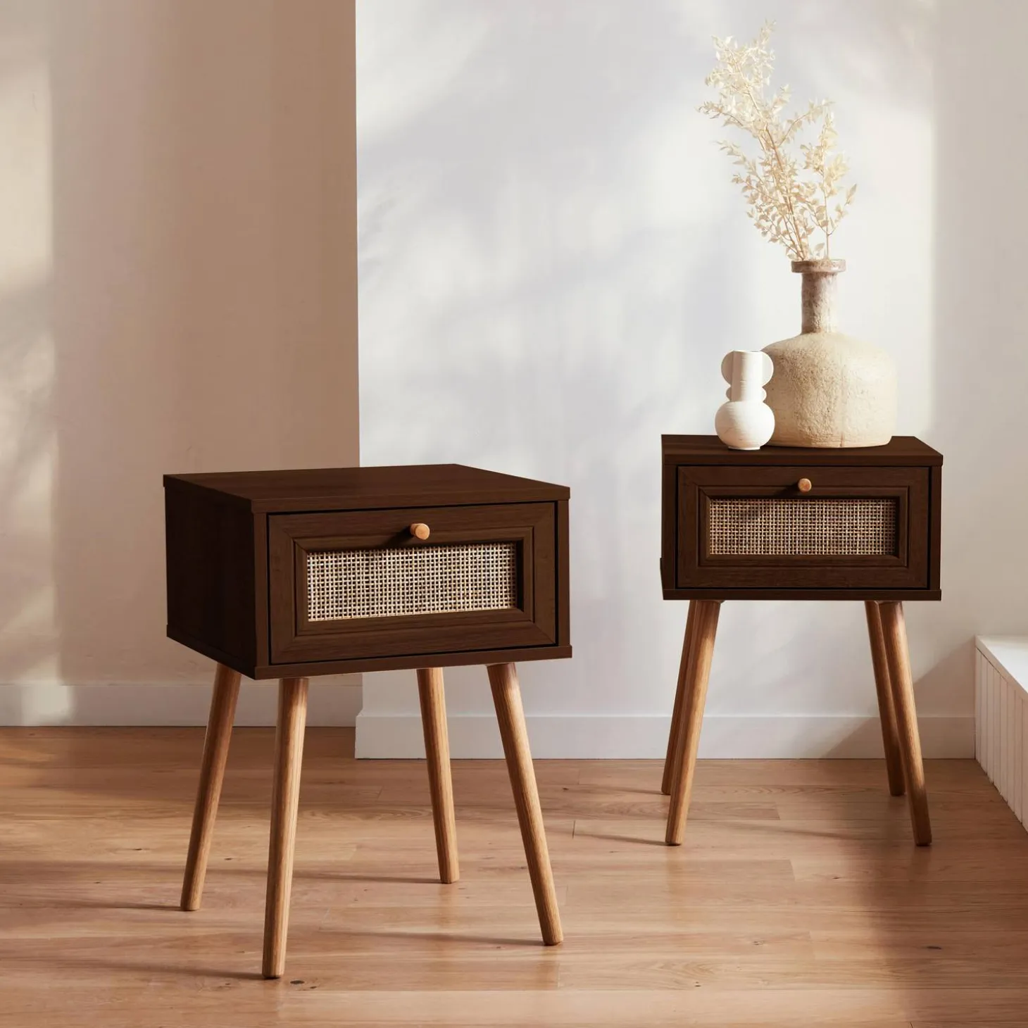 Pair of woven rattan bedside tables with drawer