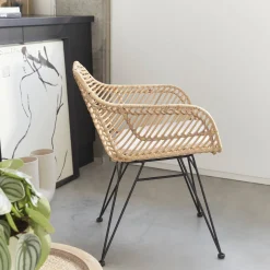 Rattan armchair with removable cushion